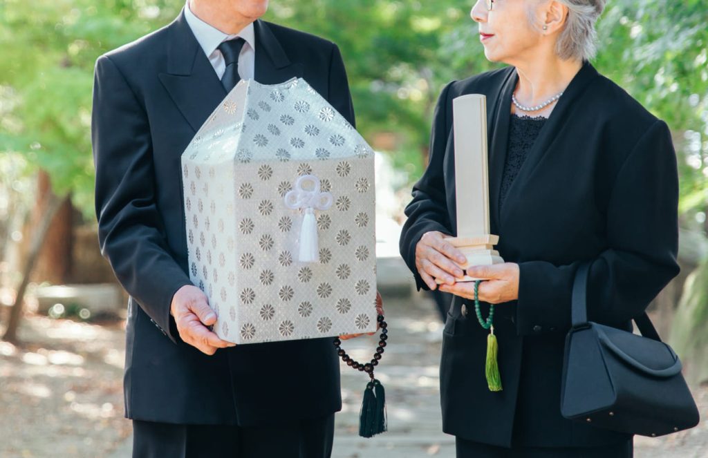 遺族として