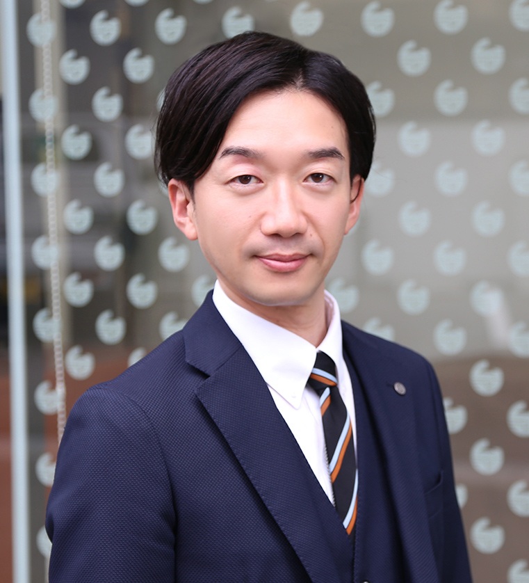鶴岡　達